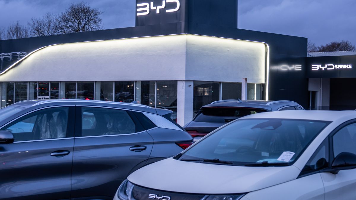 BRISTOL, UNITED KINGDOM - FEBRUARY 20: Brand new unregistered BYD electric cars are displayed for sale outside a BYD dealership, on February 20, 2025 in Bristol, England. Chinese owned car maker BYD has become the country's fastest-growing automotive brand after launching in the UK in 2023. In 2024 it saw a surge in sales expanding both its market share and retail sites. The government's commitment to reducing future Co2 carbon emissions will mean many more motorists will need to switch from petrol and diesel powered cars to electric (EV) driven ones. However there are also fears that the charging network in the UK is not yet fit to deal with the enormous demand more EVs on the road would place on it. (Photo by Anna Barclay/Getty Images)