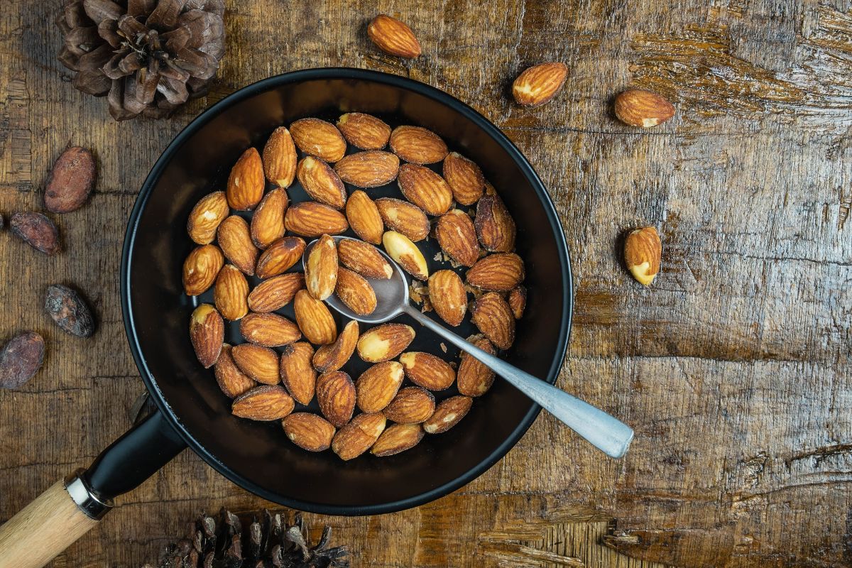 Roasting almonds in a pan