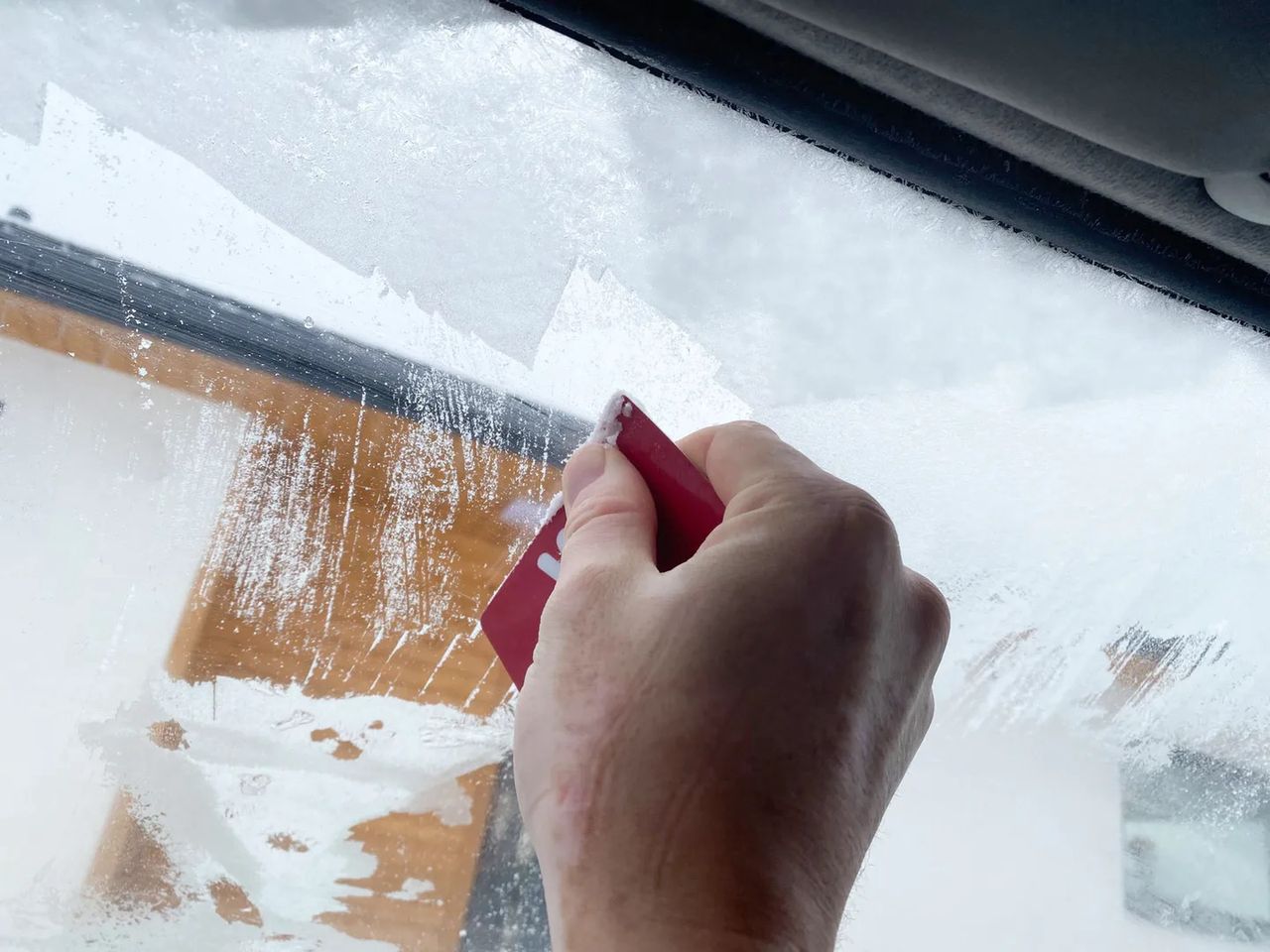 Scraping windows from the inside can be bothersome.