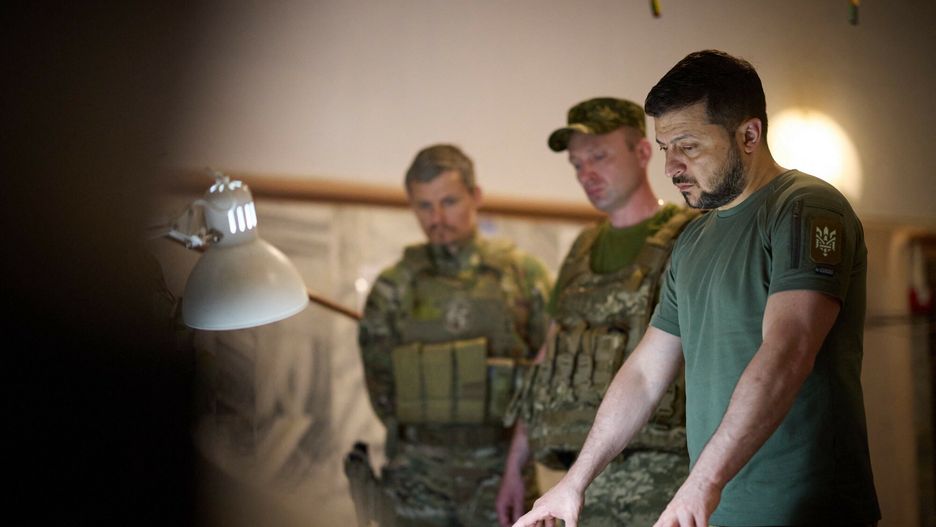 Temporary
This handout picture taken and released by the Ukrainian Presidential press service on July 8, 2022 shows Ukraine President Volodymyr Zelensky looking at a map during his visit to the position of the Ukrainian army in Dnipro region. (Photo by UKRAINIAN PRESIDENTIAL PRESS SERVICE / AFP) / RESTRICTED TO EDITORIAL USE - MANDATORY CREDIT "AFP PHOTO / UKRAINIAN PRESIDENTIAL PRESS SERVICE" - NO MARKETING NO ADVERTISING CAMPAIGNS - DISTRIBUTED AS A SERVICE TO CLIENTS
STR