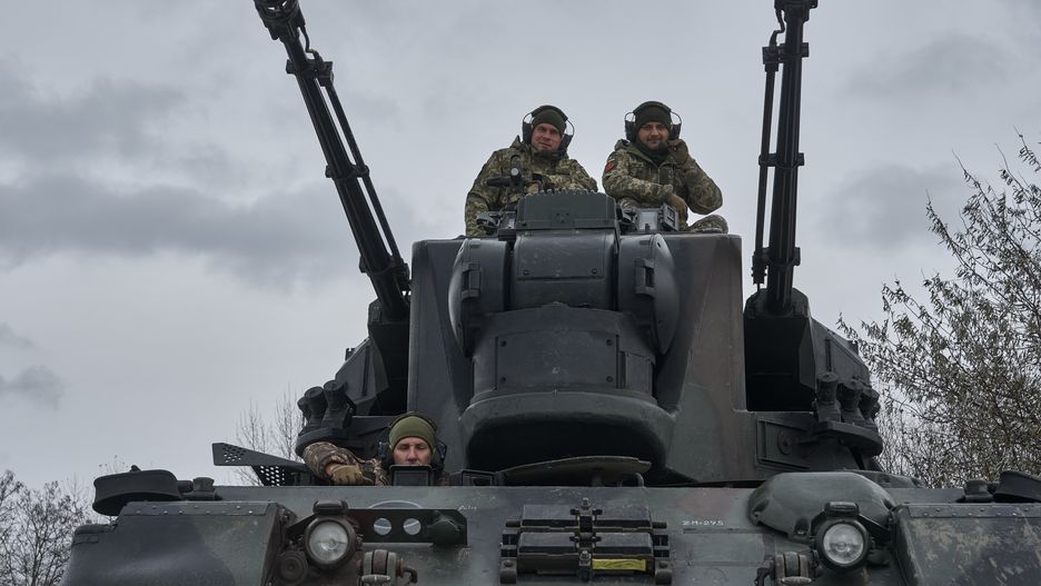 UKRAINE - NOVEMBER 23:  Ukranian soldiers on air defense combat duty operate a Flakpanzer Gepard, self-propelled anti-aircraft gun, on November 23, 2023 in the direction of Kyiv, Ukraine. The Gepard (German Flugabwehrkanonenpanzer (also Flakpanzer, FlakPz) Gepard - a tank with an anti-aircraft gun) is a German anti-aircraft self-propelled artillery installation produced by the Krauss-Maffei company in cooperation with other companies. A modified chassis from the Leopard 1 tank and an artillery section based on two 35 mm Oerlikon KDA guns were used. Entered service in Germany, Belgium, and the Netherlands in the second half of the 1970s. The combat baptism took place in 2022 during the Russian-Ukrainian war. It is intended for the protection of armored columns on the march and stationary objects from attacks from helicopters and airplanes at low and ultra-low altitudes day and night under any weather conditions and in conditions of intensive radio-electronic countermeasures by the enemy.  (Photo by Kostya Liberov/ Libkos/Getty Images)