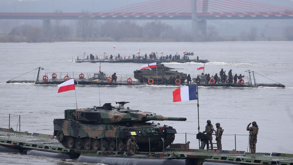 GNIEW, POLAND - MARCH 05: A Polish Leopard 2PL main battle tank arrives on a French military ferry while crossing the Vistula River during the NATO Dragon 24 military exercise on March 05, 2024 near Gniew, Poland. Dragon 24 is involving troops from 10 different nations and is part of Steadfast Defender, an ongoing set of NATO military manoeuvres across Europe that is involving 90,000 troops. (Photo by Sean Gallup/Getty Images)