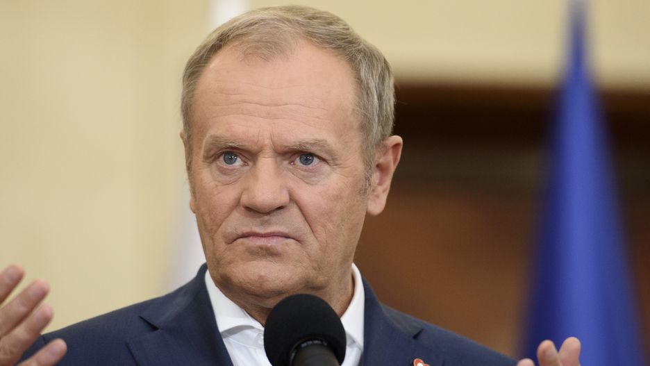 Poland's PM Donald Tusk gestures as he speaks during a press conference in Warsaw, Poland, on October 29, 2024.
