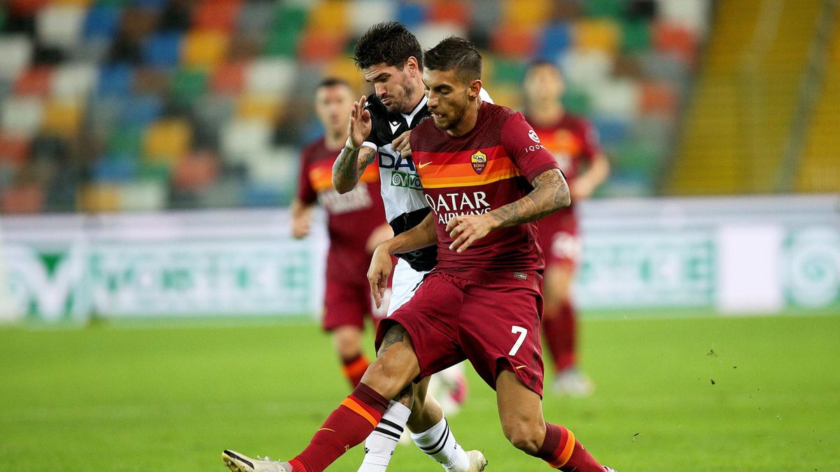 PAP/EPA / GABRIELE MENIS  / Na zdjęciu: Rodrigo De Paul i Lorenzo Pellegrini walczą o piłkę