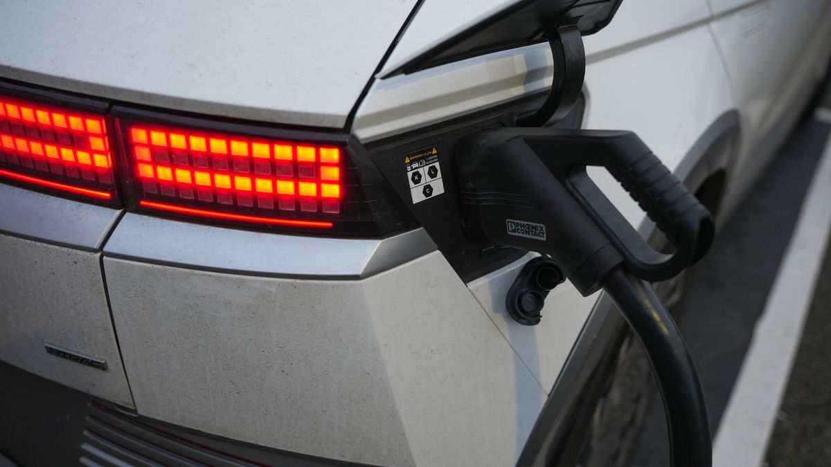 NORTHWICH, ENGLAND - NOVEMBER 26: A Hyundai Ioniq 5 electric car charges at an Instavolt DC rapid charger on November 26, 2025 in Northwich, England. In her Autumn Budget presented today, Chancellor Rachel Reeves has introduced a new tax for electric and hybrid vehicles. Beginning in April 2028, electric car drivers will have to pay 3p per mile, and plug-in hybrid drivers will pay 1.5p per mile.  (Photo by Christopher Furlong/Getty Images)