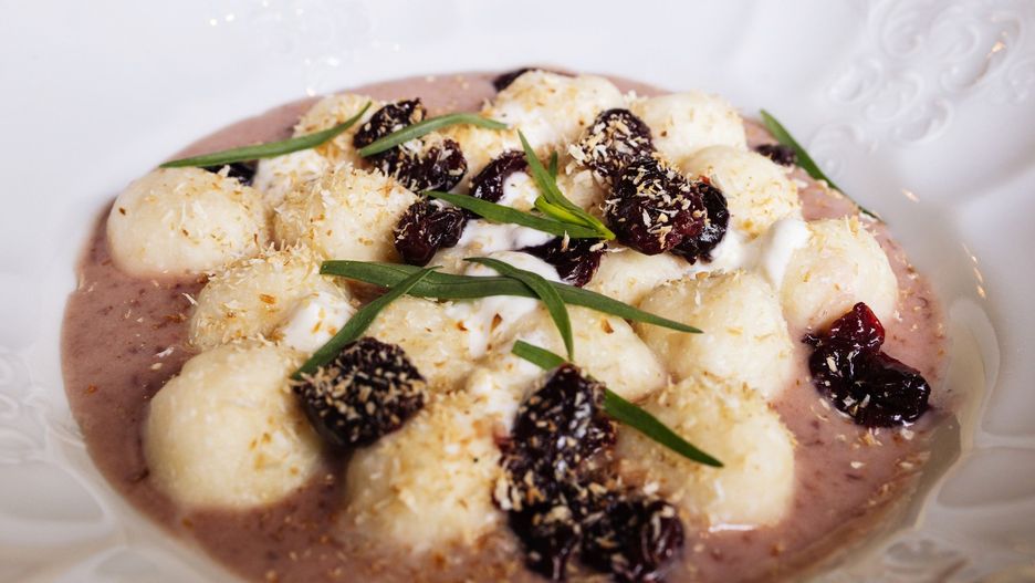 Plate with lazy dumplings with berries. Traditional ukrainian cuisine