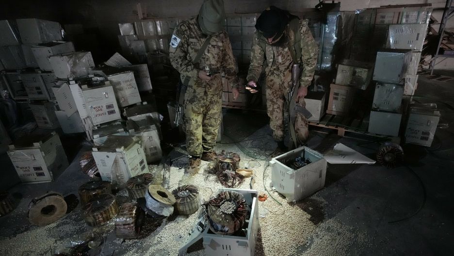 Temporary
Syrian members of the rebel group inspecting electrical components that were used to hide amphetamine pills known as Captagon hidden at the warehouse where the drug was manufactured before the fall of Bashar Assad government at a facility in Douma city, outskirts of Damascus, Syria, Friday, Dec. 13, 2024. (AP Photo/Hussein Malla)
Hussein Malla
