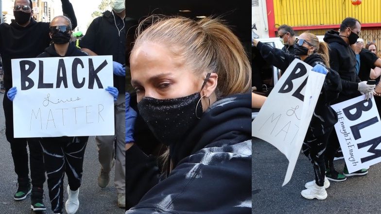 Jennifer Lopez paraduje z tablicą "Black Lives Matter"