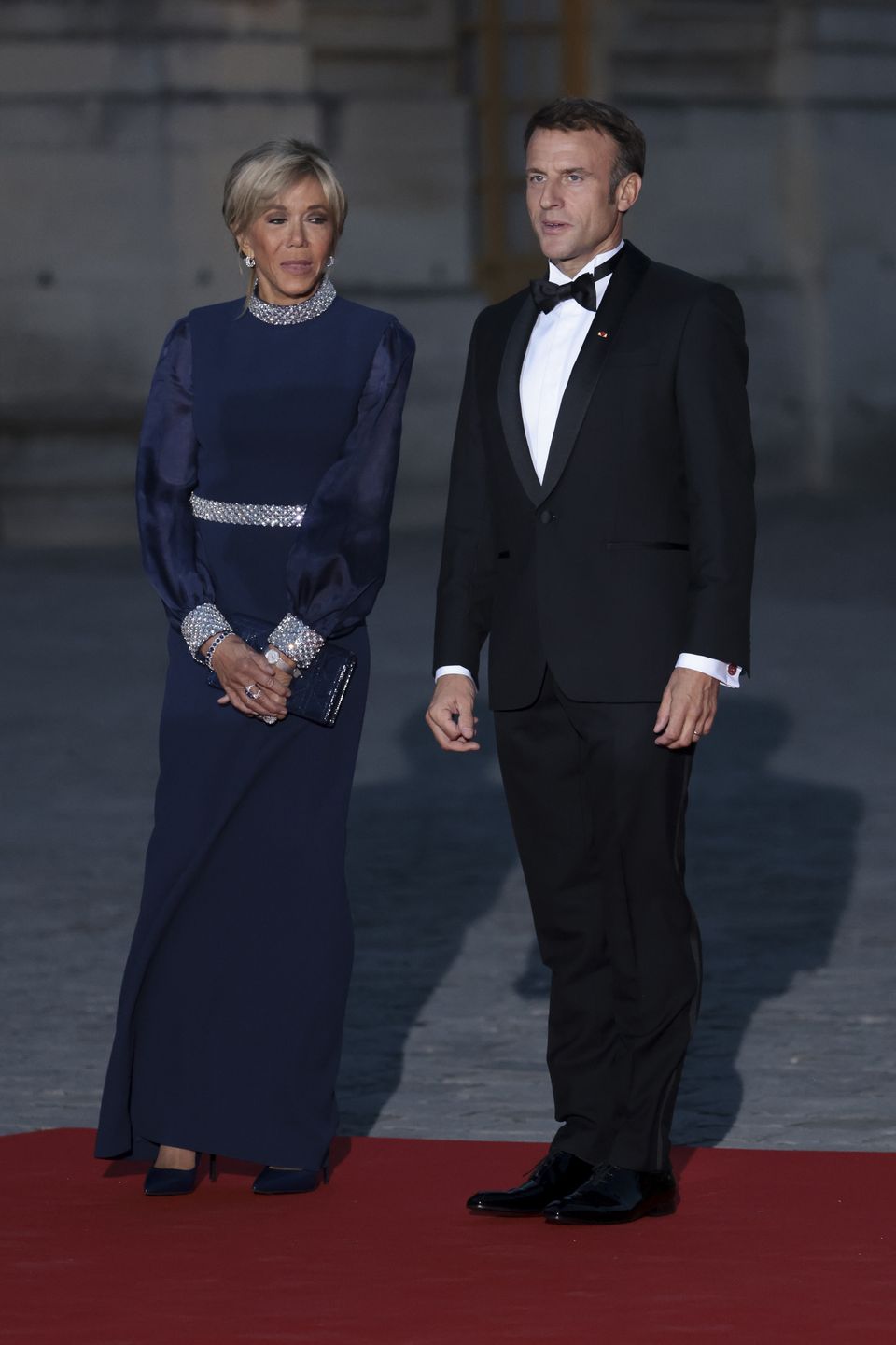 Emmanuel i Brigitte Macron na wieczornym spotkaniu z brytyjską parą królewską