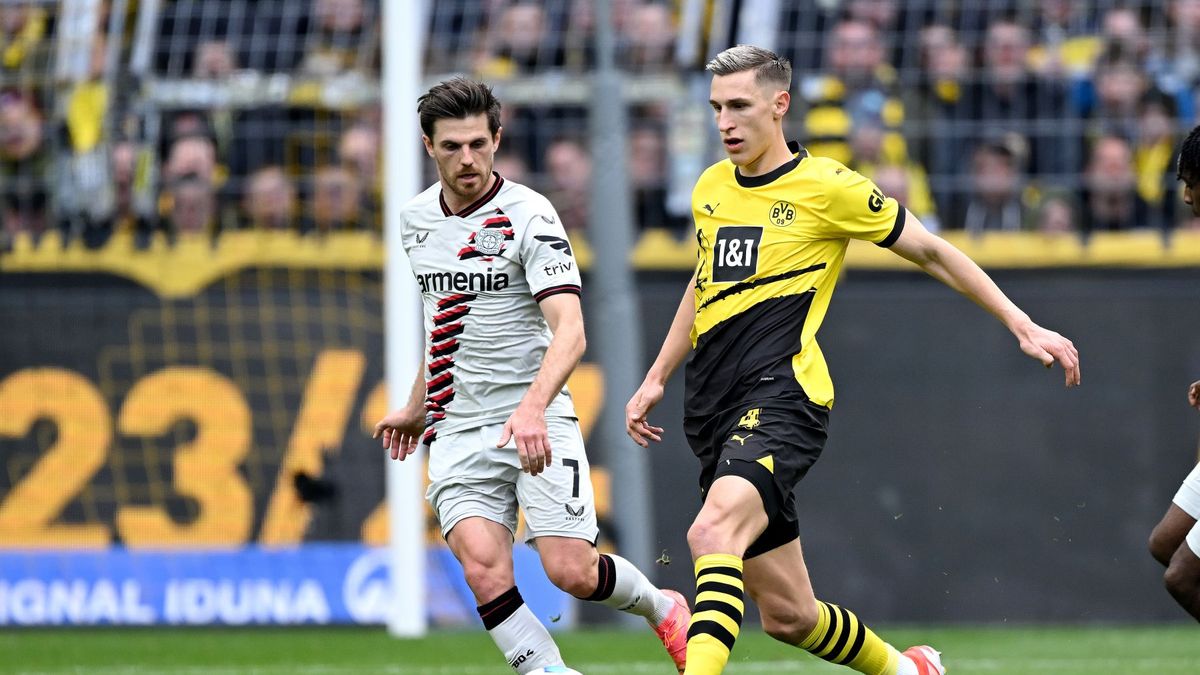 Getty Images / GERRIT VAN COLOGNE  / Na zdjęciu: Jonas Hofmann (biała koszulka) i Nico Schlotterbeck