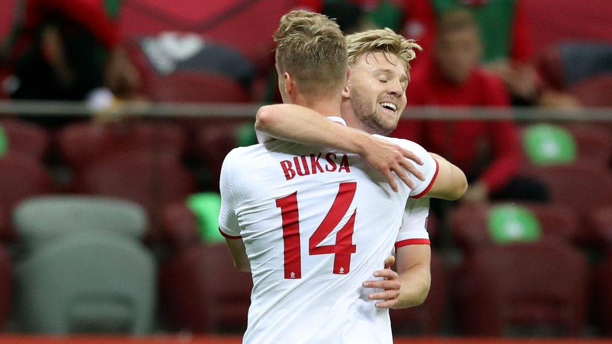 PAP / Leszek Szymański / Na zdjęciu: Adam Buksa w objęciach Kamila Jóźwiaka