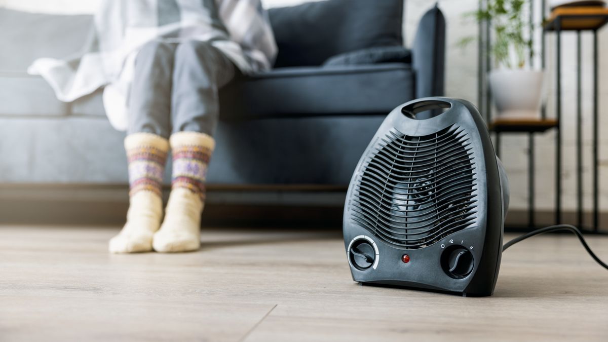 woman warming cold room with electric heater at home. heating season
ronstik
heater, room, cold, electric, heating, warm, home, house, winter, woman, temperature, electricity, wool, socks, blanket, price, climate, comfort, radiator, season, person, sofa, sit, warmth, floor, heat, plastic, black, fan