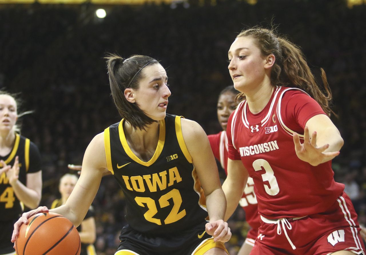 Iowa dominates Wisconsin with Clark's historic 32 points