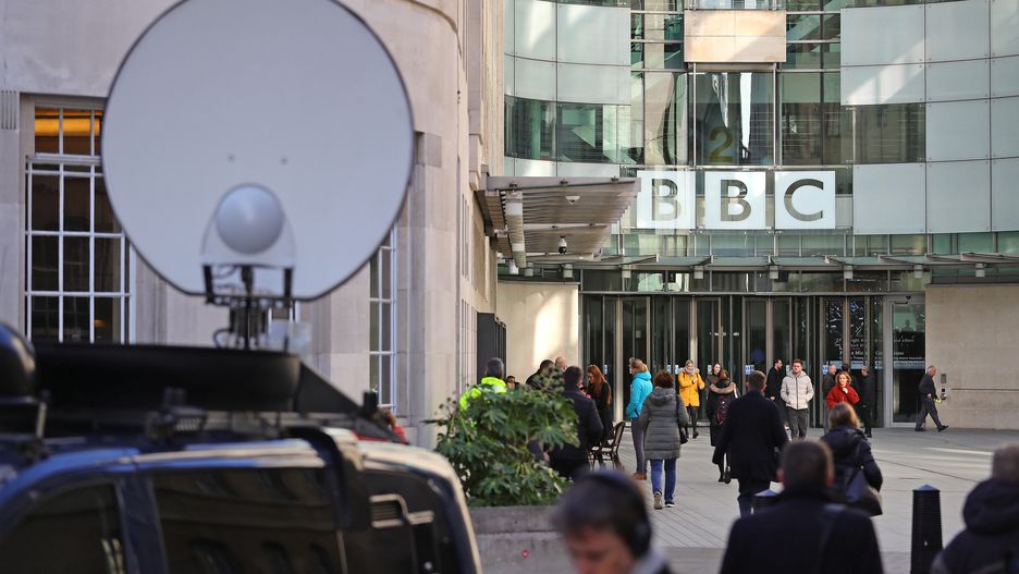 Media trucks outside BBC Broadcasting House in London, they are to announce cuts to its news division as part of a cost-cutting drive. (Photo by Aaron Chown/PA Images via Getty Images)