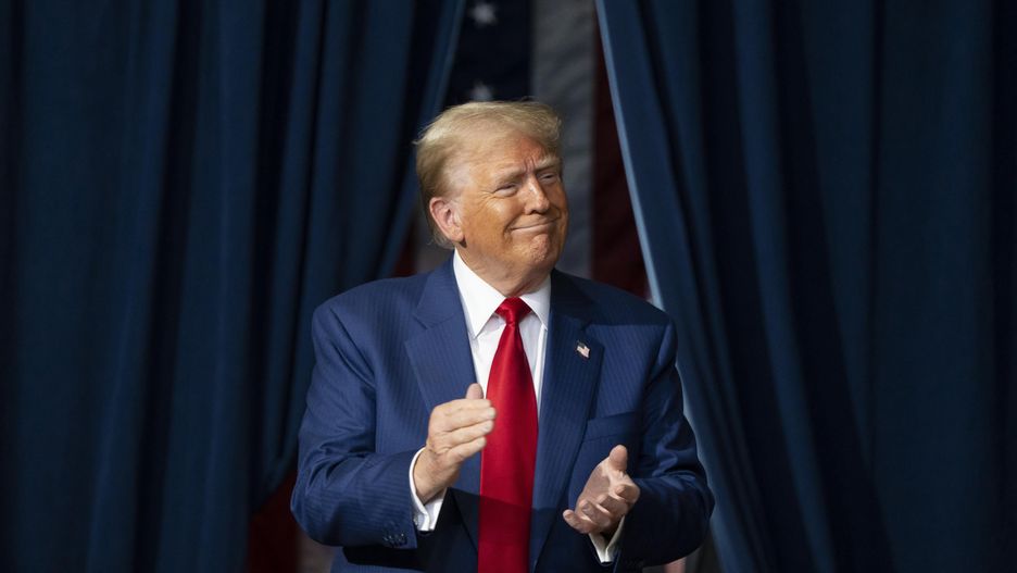 PRESCOTT VALLEY, ARIZONA - OCTOBER 13: U.S. Republican presidential nominee, former President Donald Trump takes the stage during a campaign rally at Findlay Toyota Center on October 13, 2024 in Prescott Valley, Arizona. With leaders of the Border Patrol union in attendance, Trump pledged to hire 10,000 additional border patrol agents if reelected, intensifying his attacks on Democratic opponent Kamala Harris on the issue.  (Photo by Rebecca Noble/Getty Images)