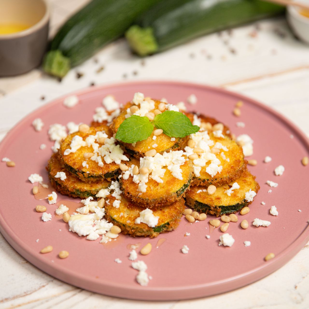 Breaded courgettes with feta and honey