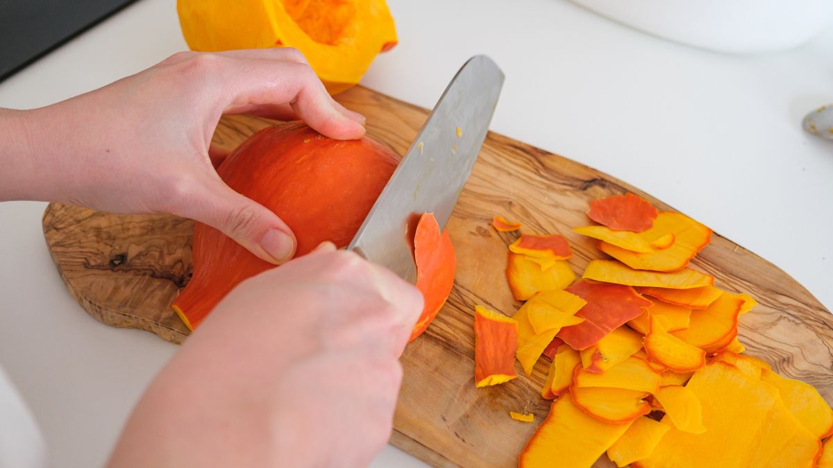 Fresh pumpkin being peeled
Fresh pumpkin being peeled with a knife, ready for cooking or baking
Aleksandr Fedosov