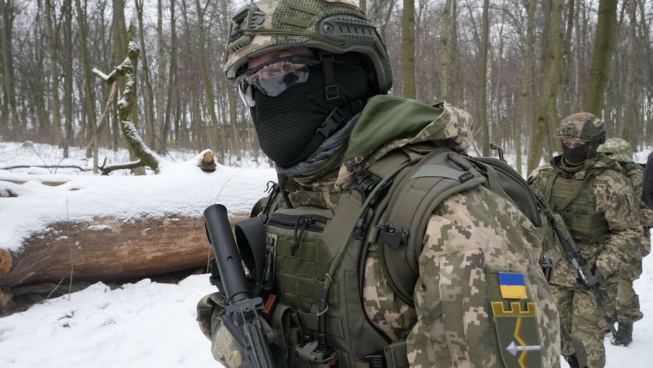 arch49Members of Ukraine's Territorial Defense Forces, volunteer military units of the Armed Forces, train in a city park in Kyiv, Ukraine, Saturday, Jan. 22, 2022. Dozens of civilians have been joining Ukraine's army reserves in recent weeks amid fears about Russian invasion. (AP Photo/Efrem Lukatsky)AP
