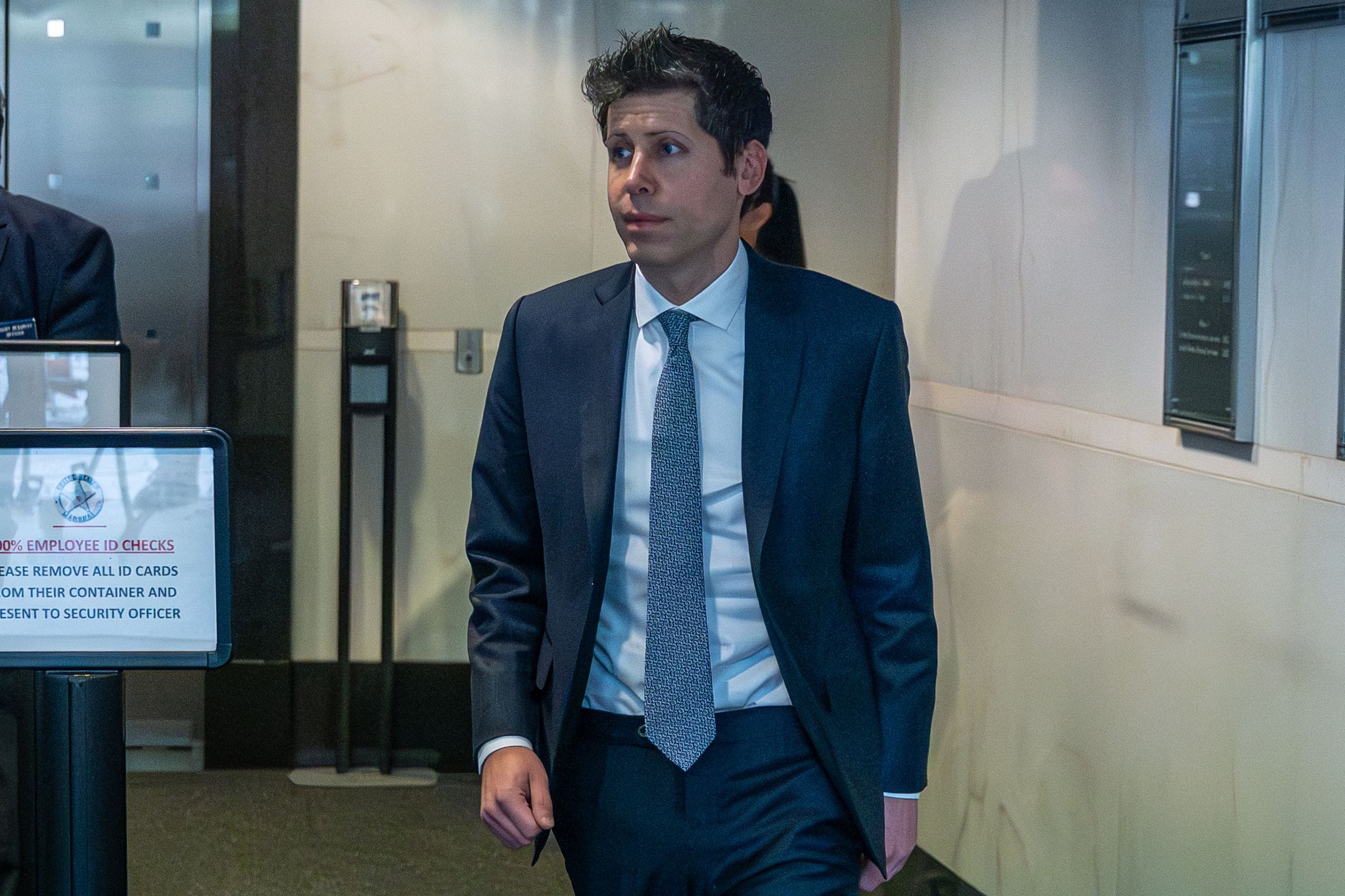 Sam Altman, chief executive officer and co-founder of OpenAI Inc., arrives at federal court in Oakland, California, US, on Tuesday, May 12, 2026. Elon Musk is suing OpenAI and Microsoft Corp. over claims that the startup abandoned its founding mission when it took billions of dollars in backing from the software stalwart and planned its restructuring. Photographer: David Paul Morris/Bloomberg via Getty Images