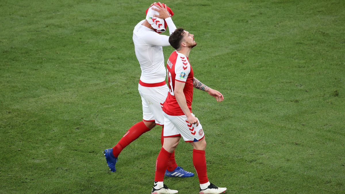 COPENHAGEN, DENMARK - JUNE 12: Jannik Vestergaard and Pierre-Emile Hojbjerg of Denmark look dejected after the UEFA Euro 2020 Championship Group B match between Denmark and Finland on June 12, 2021 in Copenhagen, Denmark. (Photo by Wolfgang Rattay - Pool/Getty Images)