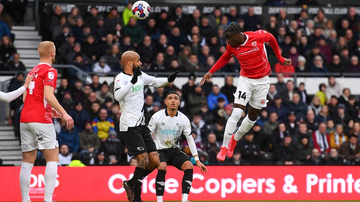 Arthur Gnahoua of Morecambe heads at goal during the Sky Bet League 1 match between Derby County and Morecambe at the Pride Park, Derby on Saturday 4th February 2023. (Photo by Jon Hobley/MI News/NurPhoto via Getty Images)