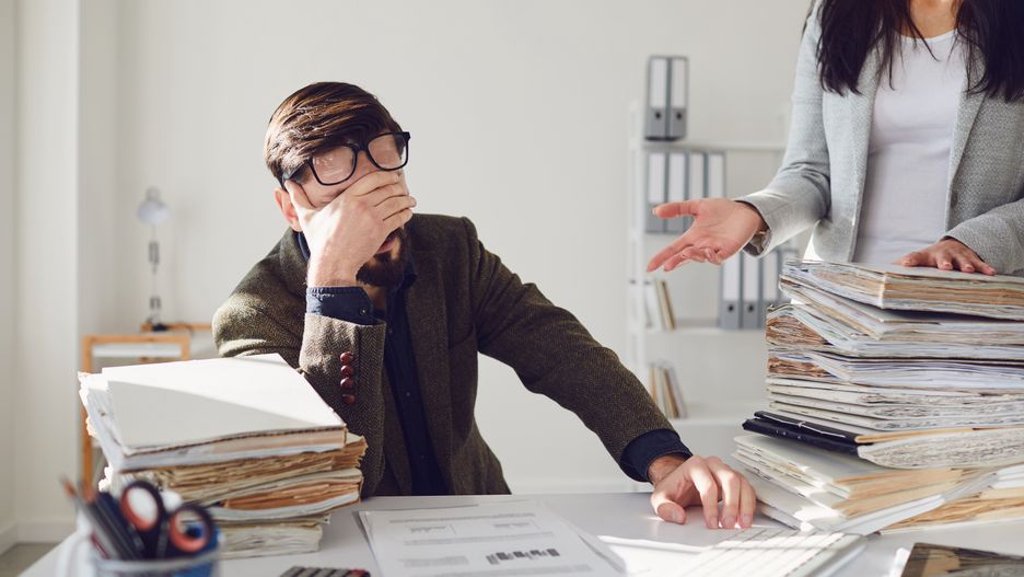 Worker businessman tired upset indignant unhappy sitting at workplace work in the office.Worker businessman tired upset indignant unhappy sitting at workplace looks at a large amount of work in the office.businessman, fatigue, stress, work, problem, inspector, stressed, mobbing, unfair, office, worker, business, boss, auditor, trouble, announce, stack, announcement, employer, holding, young, background, upset, person, people, leader, career, man, job, woman, manager, working, tired, businesswoman, corporate, paperwork, desk, lawyer, crisis, unhappy, sitting, management, inspection, check, folders, overtime, despair, pile, financial, businessman, fatigue, stress, work, problem, inspector, stressed, mobbing, unfair, office, worker, business, boss, auditor, trouble, announce, stack, announcement, employer, holding, young, background, upset, person, people, leader, career, man, job, woman, manager, working, tired, businesswoman, corporate, paperwork, desk, lawyer, crisis, unhappy, sitting, management, inspection, check, folders, overtime, despair, pile, financial
