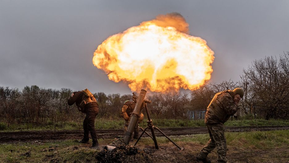 DONETSK OBLAST, UKRAINE - APRIL 20: Ukrainian soldiers of the 57th Brigade fire a mortar in the direction of Bakhmut, in Donetsk Oblast, Ukraine on April 20, 2023. (Photo by Diego Herrera Carcedo/Anadolu Agency via Getty Images)