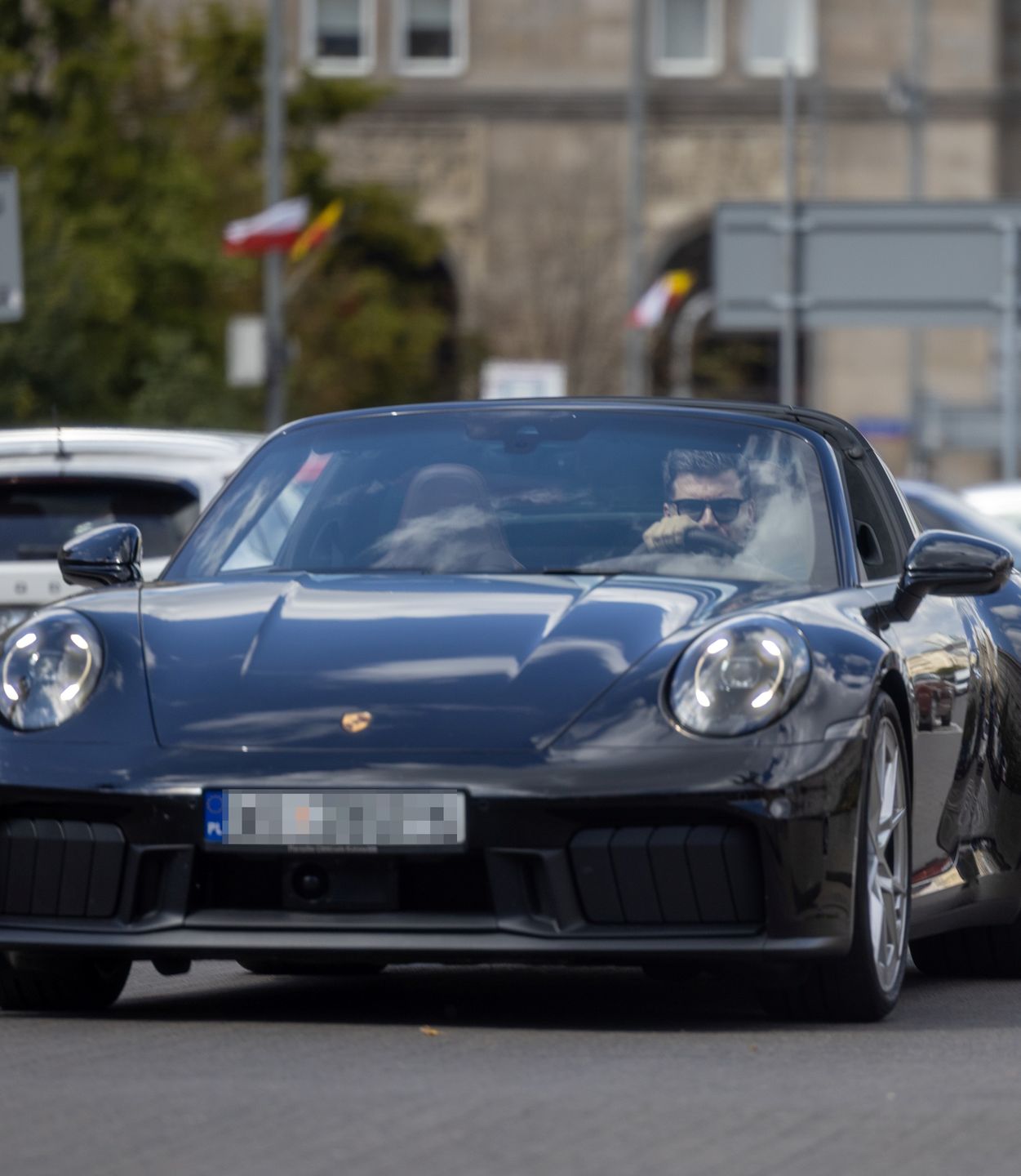 Tomasz Kammel wozi się porsche