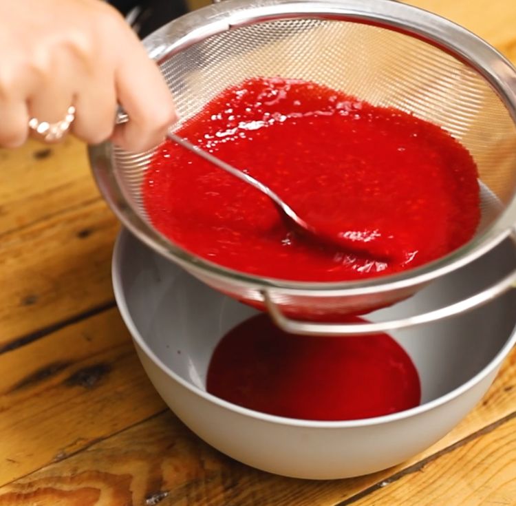 Straining raspberries