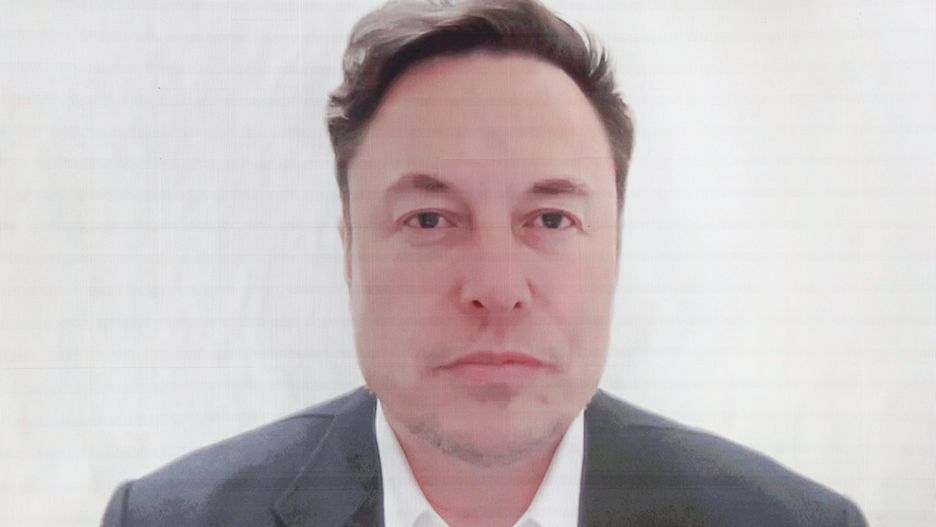 Elon Musk, chief executive officer of Tesla Inc., appears via video link during the Qatar Economic Forum in Doha, Qatar, on Tuesday, June 21, 2022. The second annual Qatar Economic Forum convenes global business leaders and heads of state to tackle some of the world's most pressing challenges, through the lens of the Middle East. Photographer: Christopher Pike/Bloomberg via Getty Images