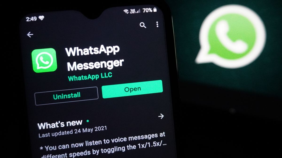 The logo of the messenger app WhatsApp is seen on the screen of a smartphone in New Delhi, India on May 27, 2021. WhatsApp has filed a legal complaint in Delhi against the government seeking to block regulations coming into force from Wednesday that experts say would compel the California-based Facebook unit to break privacy protections, according to Reuters sources. (Photo by Mayank Makhija/NurPhoto via Getty Images)