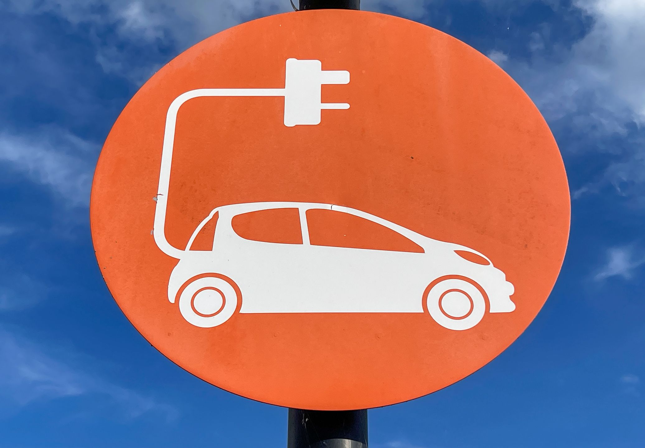 BRISTOL, UNITED KINGDOM - OCTOBER 18: A sign for a charging point for electric cars is displayed on, October 18, 2023 in Bristol, England. The European Union plans to ban all new sales of carbon-emitting petrol and diesel cars by 2035. Originally the UK planned to ban the sale of new petrol and diesel cars in Britain will by 2030, however this has recently put back still further. Critics of the laws have expressed concern that many internal combustion engined carbon polluting cars, lorries and vans will be still on the roads long after the ban on their sale. (Photo by Matt Cardy/Getty Images)