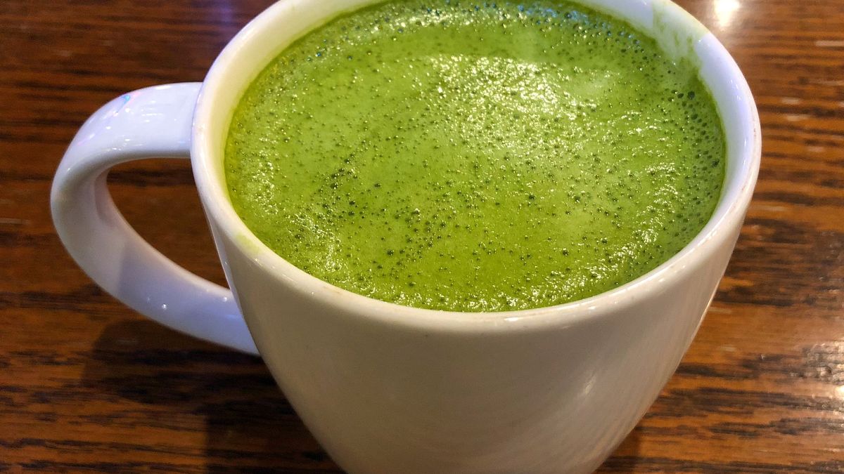 Hot green tea latteHot green tea latte on the wood tablejointstar