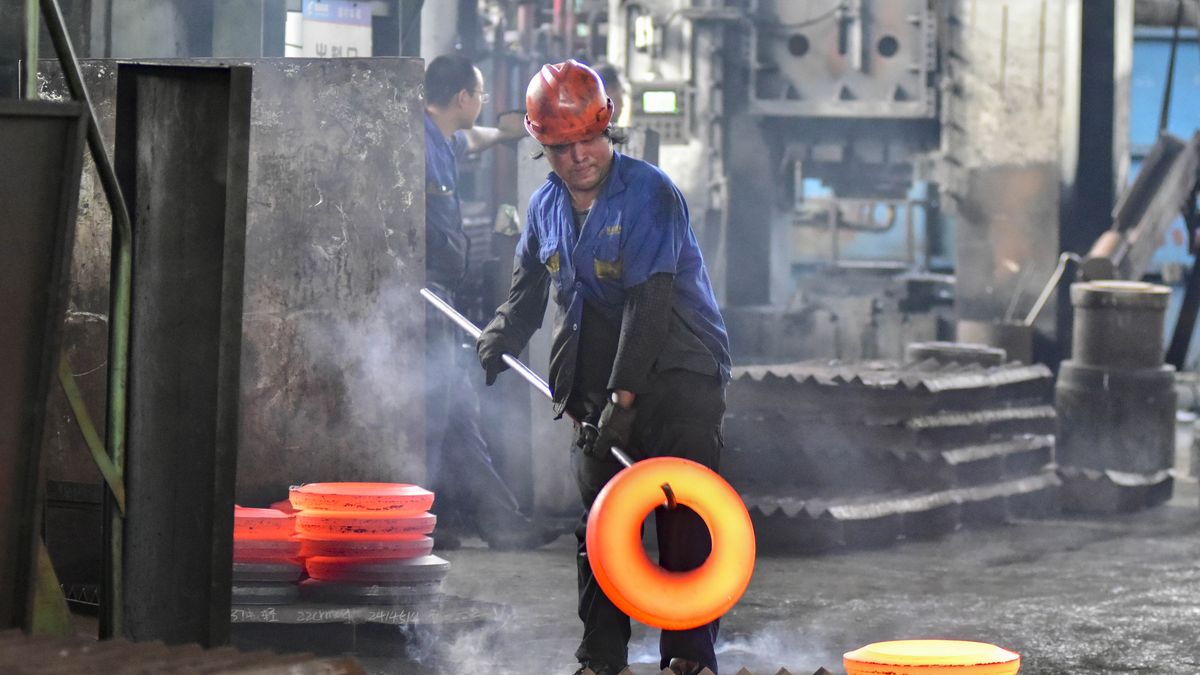 A worker works at an auto gear manufacturing company in Qingzhou Economic Development Zone in Qingzhou, China, on September 30, 2024. On the same day, the Service Industry Survey Center of the National Bureau of Statistics and the China Federation of Logistics and Purchasing release data showing that the manufacturing purchasing managers index (PMI) is 49.8% in September 2024, up 0.7 percentage points from the previous month. (Photo by Costfoto/NurPhoto via Getty Images)