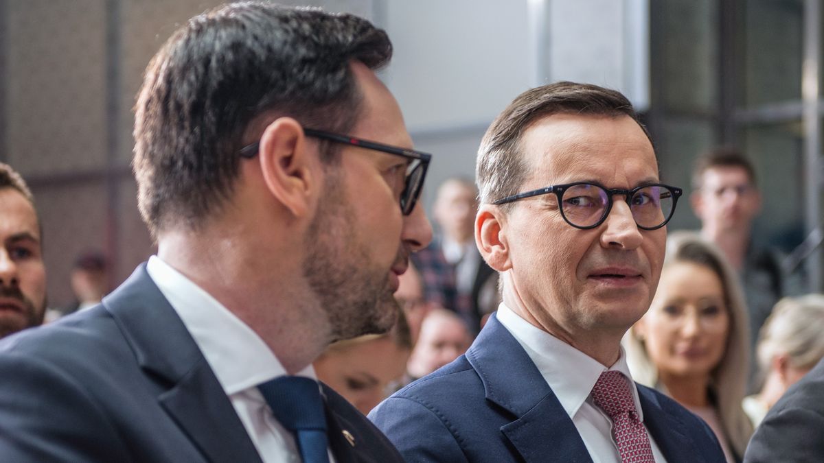 WARSAW, POLAND - 2023/04/17: Daniel Obajtek (L), the President and CEO of the Polish Oil Company ORLEN and Prime Minister Mateusz Morawiecki (M) seen at the press conference in Warsaw. Daniel Obajtek, the President and CEO of the Polish Oil Company ORLEN, announced the details of the planned investments in Small Modular Reactors (SMR) for Poland. For this purpose, the company Orlen Synthos Green Energy (OSGE) was established, supported by the Polish billionaire - Michal Solowow. OSGE will buy reactors from US-based GE Hitachi. (Photo by Attila Husejnow/SOPA Images/LightRocket via Getty Images)
