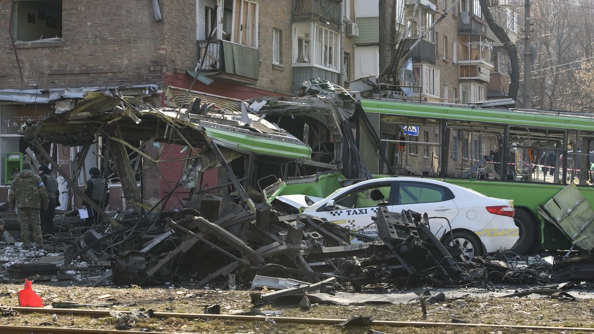 Destroyed trolleybus and car on the street in Residential district of Kyiv  near a building destroyed by shelling as Russia's attack on Ukraine continues, in Kyiv, Ukraine March 14, 2022.  (Photo by Maxym Marusenko/NurPhoto via Getty Images)