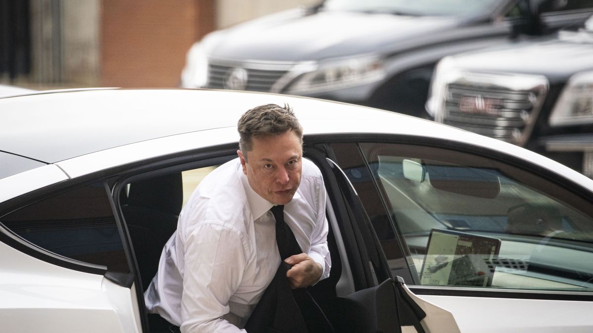 Elon Musk, chief executive officer of Tesla Inc., arrives at court during the SolarCity trial in Wilmington, Delaware, U.S., on Tuesday, July 13, 2021. Musk was cool but combative as he testified in a Delaware courtroom that Tesla's more than $2 billion acquisition of SolarCity in 2016 wasn't a bailout of the struggling solar provider. Photographer: Al Drago/Bloomberg via Getty Images
