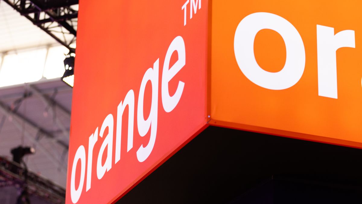 BARCELONA, SPAIN - MARCH 06: A logo sits illuminated at the Orange booth  at Mobile Congress 2025 on March 06, 2025 in Barcelona, Spain. The Mobile World Congress 2025 has seen its best attendance figures since the pandemic, with around 109,000 attendees. Artificial Intelligence was the most important topic during the congress, with 2,900 exhibiting companies, in addition to new developments and technological innovations. (Photo by Eric Alonso/Getty Images)