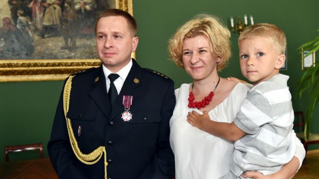 St. kpt. Dominik Janosz z żoną i synem