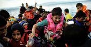 Davutoglu o migrantach: Turcja nie jest obozem koncentracyjnym