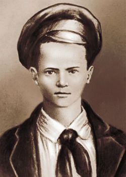 Pawlik Morozow, który miał zadenuncjować własnego ojca. Przez propagandę był stawiany za wzór dzieciom i młodzieży. Portret propagandowy, ok. 1932 r. 