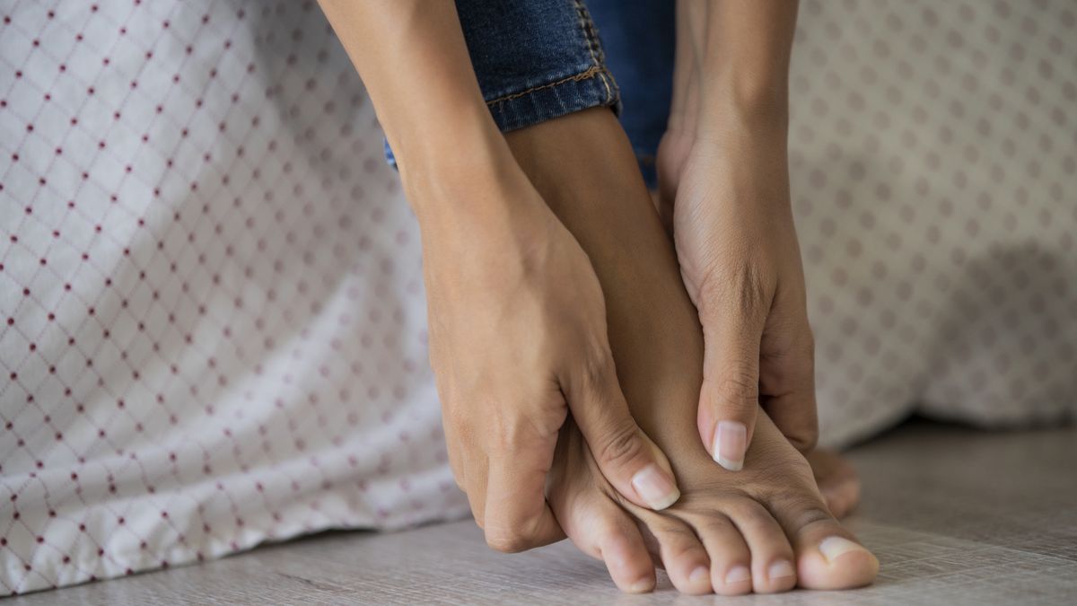Low section of young woman massaging her foot
Close-up of young woman massaging her foot in bedroom
Mindful Media