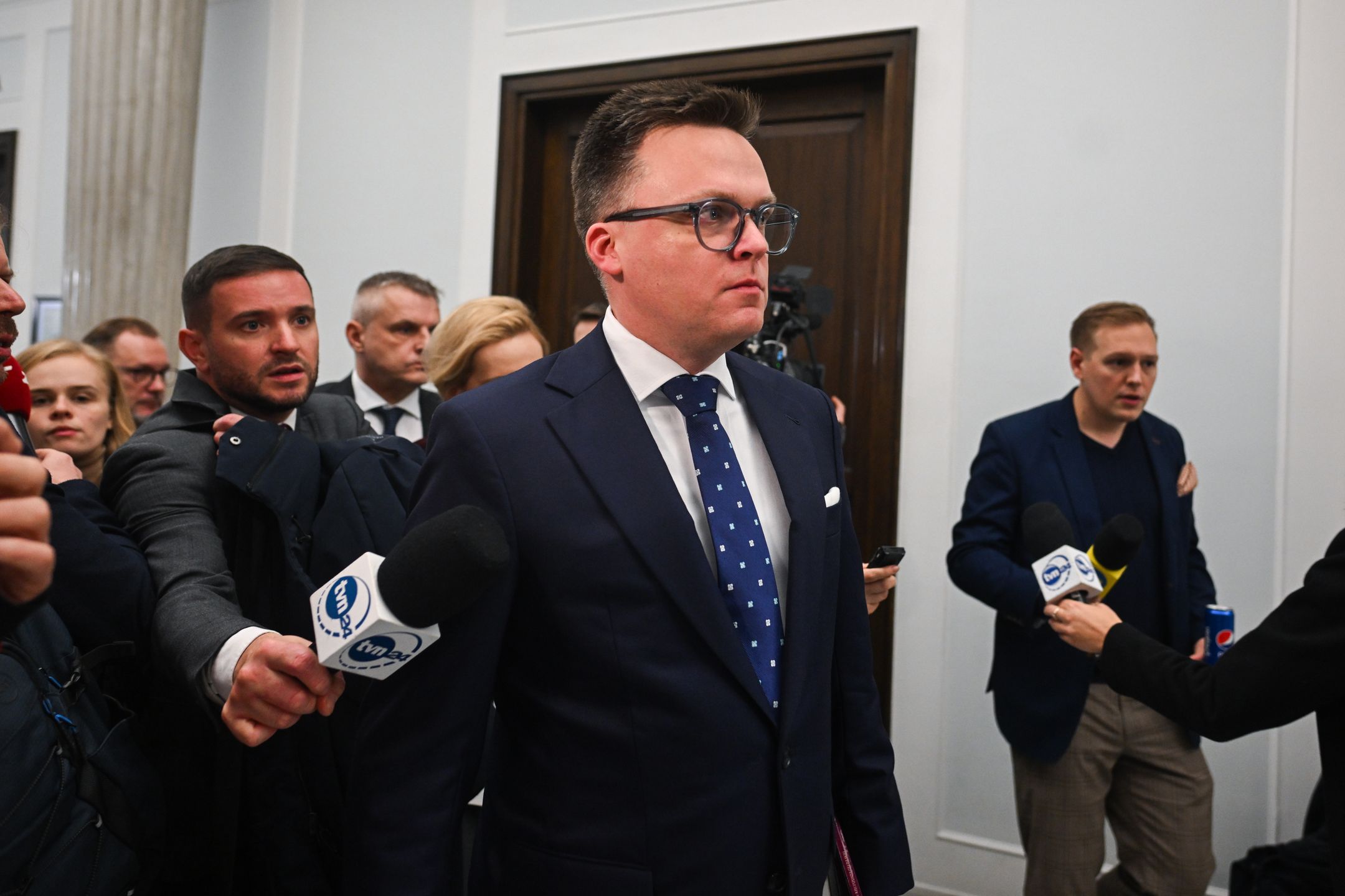 WARSAW, POLAND - DECEMBER 12: Speaker of the Parliament, Szymon Holownia talks to the press after Grzegorz Braun, member of far-right political alliance Confederation used a fire extinguisher to put out the Hanukkah menorah candles at the Parliament (SEJM) on December 12, 2023 in Warsaw, Poland. on December 12, 2023 in Warsaw, Poland. After eight years of Poland's national conservative party in power, centrist Donald Tusk is back and set to forge a pro-EU government. (Photo by Omar Marques/Getty Images)