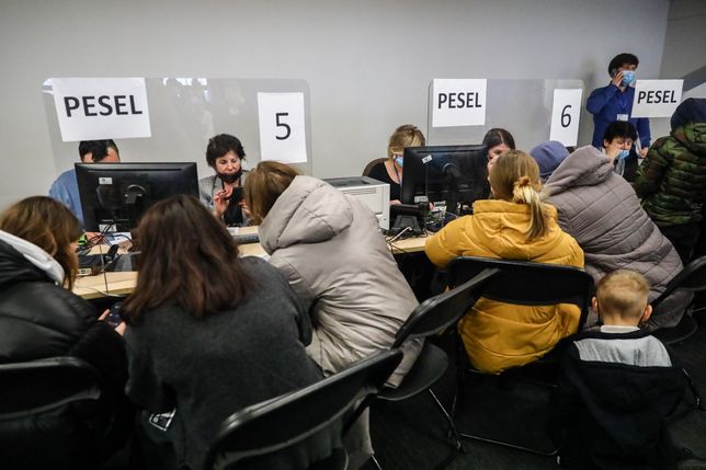 Refugees from Ukraine who fled to Poland after Russian attack are seen at the register point in Tauron Arena to obtain a PESEL national identification number and remain in the country. Krakow, Poland on March 16, 2022. Russian invasion on Ukraine causes a mass exodus of refugees to Poland.   (Photo by Beata Zawrzel/NurPhoto via Getty Images)