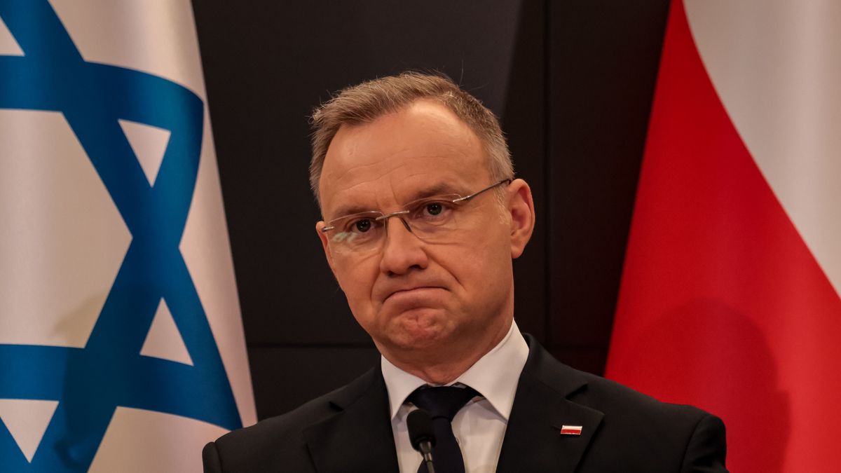 OSWIECIM, POLAND - 2025/04/24: Andrzej Duda, president of the Republic of Poland speaks during the joint press statement with the president of Israel, Isaac Hertzok at the Auschwitz Museum - former Nazi German Concentration Camp during the International March of the Living (MOTL). MOTL takes place on Holocaust Remembrance Day, it gathers Holocaust survivors, families and supporters. They walk three kilometers between the Auschwitz camp and Birkenau the extermination centre in memory of the holocaust victims of World War II. (Photo by Dominika Zarzycka/SOPA Images/LightRocket via Getty Images)