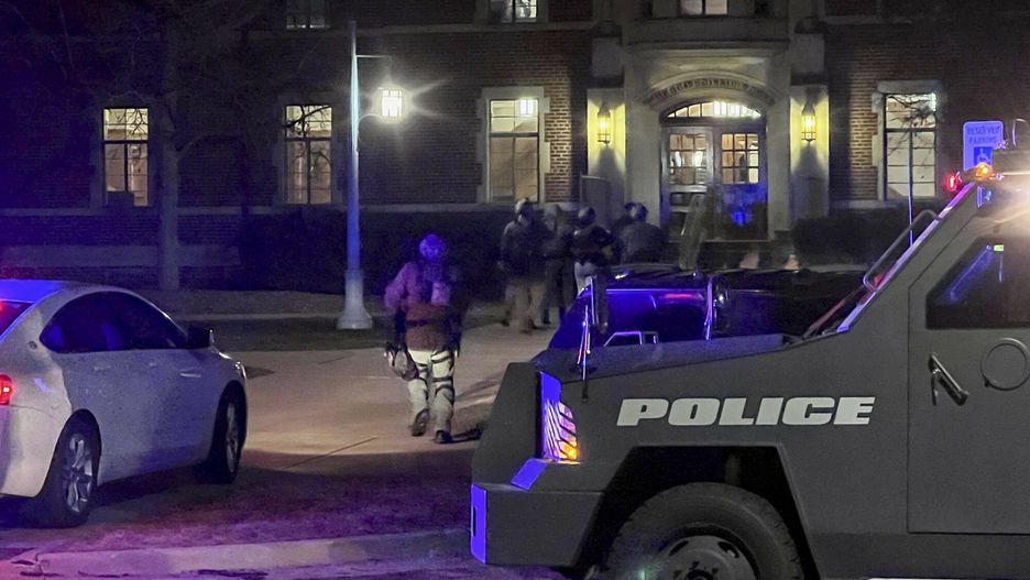 Temporary
Armed police officers with weapons drawn rush into Phillips Hall on the campus of Michigan State University, in East Lansing, Mich., as authorities respond to reports of shootings, late Monday, Feb. 13, 2023. (Jakkar Aimery/Detroit News via AP)
Jakkar Aimery