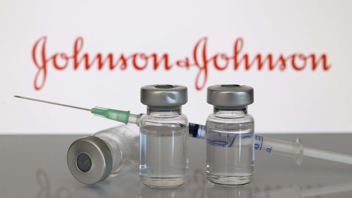 DORTMUND, GERMANY - MARCH 02 : (BILD ZEITUNG OUT) Photo Illustration A syringe lies on a bottle of fluid in front of Johnson und Johnson's logo due to Johnson und Johnson's new vaccine against coronavirus on March 02, 2021 in Dortmund, Germany. (Photo by Alex Gottschalk/DeFodi Images via Getty Images)