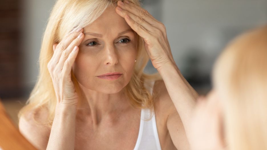 Senior woman looking at mirror and touching forehead, upset aged lady examining fine lines on her faceSenior woman looking at mirror and touching forehead, upset aged lady examining fine lines on her face, suffering skin aging, selective focus on reflectionblonde, facial, female, adult, touching, european, white, pretty, hyperpigmentation, caucasian, indoor, dermatology, anti-wrinkle, feminine, lifestyle, middle aged, background, care, attractive, skin, closeup, reflection, concept, beauty, healthy, forehead, skincare, mirror, home, beautiful, woman, aged, face, lady, 50s, treatment, upset, unhappy, hygiene, health, problem, wellness, sad, selective focus, cosmetology, domestic, wrinkles, frowning, hand, blonde, facial, female, adult, touching, european, white, pretty, hyperpigmentation, caucasian, indoor, dermatology, anti-wrinkle, feminine, lifestyle, middle aged, background, care, attractive, skin, closeup, reflection, concept, beauty, healthy, forehead, skincare, mirror, home, beautiful, woman, aged, face, lady, 50s, treatment, upset, unhappy, hygiene, health, problem, wellness, sad, selective focus, cosmetology, domestic, wrinkles, frowning, hand