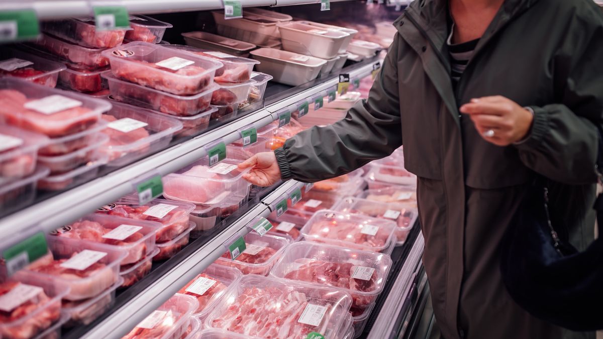 Customer Selecting Fresh Meat in a Grocery Store Aisle While Shopping
A shopper in a green jacket points at packaged meat in the refrigerated section of a supermarket, selecting products. The scene highlights everyday groceries, shopping behavior, and fresh meat choices.
Tatsiana Volkava