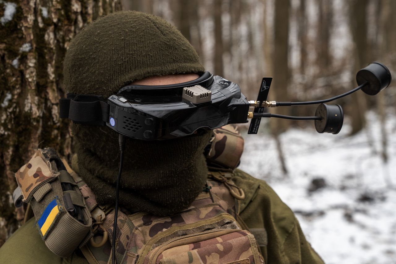 A Ukrainian soldier piloting an FPV drone somewhere in the Kharkiv region.